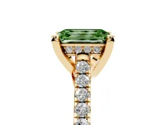 Fancy Green Emerald Cut Diamond Solitaire Ring Set in Yellow gold with Brilliant Pavé Band and Prong Setting