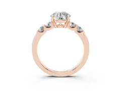 Round Cut Diamond Five-Stone Prong Set Engagement Ring Set in Rose gold with Channel Band