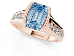 Fancy Blue Emerald Cut Diamond Bezel-Set Solitaire Ring Set in Rose gold with Channel-Set Band