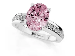 Fancy Pink Oval Cut Diamond Solitaire Ring Set in White gold with Channel Set Band and Prong Setting