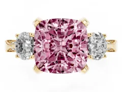 Fancy Pink Cushion Cut Diamond Three-Stone Ring Set in Yellow gold with Pavé Band and Smaller Side Stones