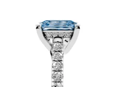 Fancy Blue Emerald Cut Diamond Solitaire Ring Set in White gold with Brilliant Pavé Band and Prong Setting