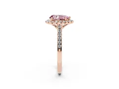 Fancy Pink Pear Cut Diamond Pavé Halo Engagement Ring Set in Rose gold with Pavé Band and Prong Setting
