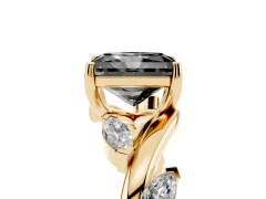 Fancy Black Radiant Cut Diamond Solitaire Ring Set in Yellow gold with Twisted Marquise Accent Band
