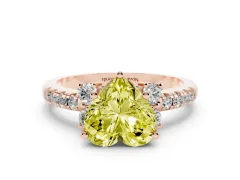 Fancy Yellow Heart Cut Diamond Three-Stone Pavé Ring Set in Rose gold with Prong Setting