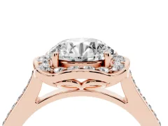 Round Cut Diamond Halo Ring Set in Rose gold with Pavé-Lined Shoulders and Prong Setting