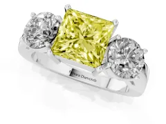 Fancy Yellow Princess Cut Diamond Three-Stone Ring Set in Silver with Round Side Stones and Classic Band