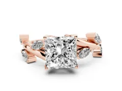 Princess Cut Diamond Solitaire Ring Set in Rose gold with Twisted Marquise Accent Band