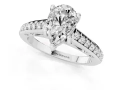 Pear Cut Diamond Prong Set Solitaire Engagement Ring Set in White gold with Pavé Band