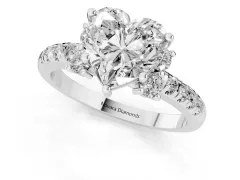 Heart Cut Diamond Three-Stone Pavé Ring Set in White gold with Prong Setting