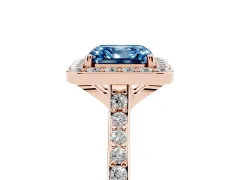 Fancy Blue Asscher Cut Diamond Halo Engagement Ring Set in Rose gold with Round Pavé Shoulders and Heart Gallery