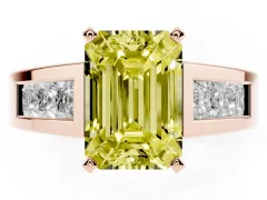 Fancy Yellow Emerald Cut Diamond Solitaire Ring Set in Rose gold with Channel-Set Accent Stones and Prong Setting