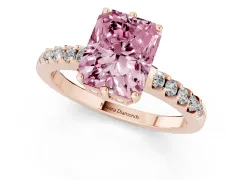 Fancy Pink Radiant Cut Diamond Solitaire Engagement Ring Set in Rose gold with Pavé Band and Prong Setting
