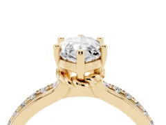 Marquise Cut Diamond Solitaire Ring Set in Yellow gold with Channel Set Band and Prong Setting