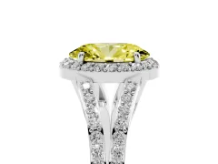 Fancy Yellow Oval Cut Diamond Halo Split Shank Pavé Ring Set in Platinum with Prong Setting