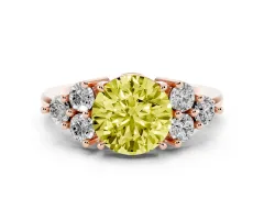 Fancy Yellow Round Cut Diamond Solitaire Ring Set in Rose gold with Cluster Accents on Each Side