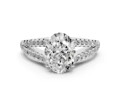 Oval Cut Diamond Split Shank Pavé Engagement Ring Set in Platinum with Prong-Held Center Stone