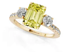Fancy Yellow Emerald Cut Diamond Three-Stone Ring Set in Yellow gold with Pavé Band and Graduated Sides