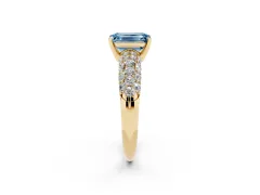 Fancy Blue Emerald Cut Diamond Pavé Band Solitaire Ring Set in Yellow gold with Close-Set Accent Stones and Prong Setting
