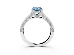 Fancy Blue Oval Cut Diamond Solitaire Ring Set in White gold with Milgrain-Edged Pavé Band and Prong Setting