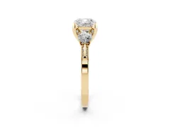 Cushion Cut Diamond Three-Stone Ring Set in Yellow gold with Pavé Band and Smaller Side Stones
