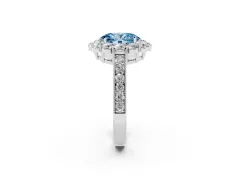 Fancy Blue Oval Cut Diamond Halo Pavé Engagement Ring Set in White gold with Milgrain Detailing