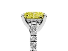 Fancy Yellow Radiant Cut Diamond Solitaire Ring Set in White gold with Brilliant Pavé Band and Prong Setting