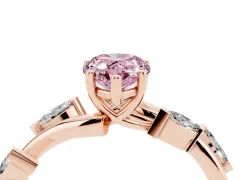 Fancy Pink Pear Cut Diamond Solitaire Ring Set in Rose gold with Twisted Marquise Accent Band