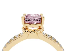 Fancy Pink Oval Cut Diamond Solitaire Ring Set in Yellow gold with Channel Set Band and Prong Setting