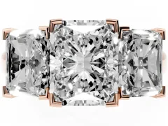 Radiant Cut Diamond Three-Stone Ring Set in Rose gold with Channel-Set Band and Prong Settings