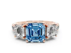 Fancy Blue Asscher Cut Diamond Three-Stone Ring Set in Rose gold with Pavé Band