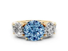 Fancy Blue Round Cut Diamond Three-Stone Ring Set in Yellow gold with Pavé Band