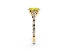 Fancy Yellow Radiant Cut Diamond Solitaire Ring Set in Yellow gold with Brilliant Pavé Band and Prong Setting