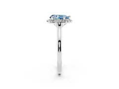 Fancy Blue Pear Cut Diamond Halo Engagement Ring Set in Silver with Pavé Band and Rising Shoulders