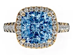 Fancy Blue Cushion Cut Diamond Halo Engagement Ring Set in Yellow gold with Pavé Band and Prong-Set Center