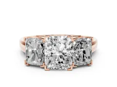 Radiant Cut Diamond Three-Stone Ring Set in Rose gold with Channel-Set Band and Prong Settings