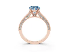 Fancy Blue Heart Cut Diamond Solitaire Ring Set in Rose gold with Milgrain-Edged Pavé Band and Prong Setting