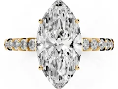 Marquise Cut Diamond Solitaire Engagement Ring Set in Yellow gold with Pavé Band and Prong Setting