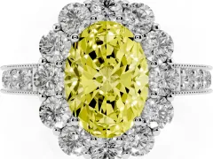 Fancy Yellow Oval Cut Diamond Halo Pavé Engagement Ring Set in White gold with Milgrain Detailing