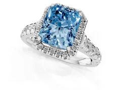 Fancy Blue Radiant Cut Diamond Halo Engagement Ring Set in Platinum with Pavé Band and Prong-Set Center