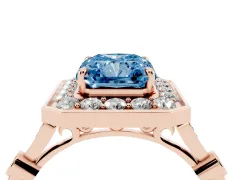 Fancy Blue Radiant Cut Diamond Halo Engagement Ring Set in Rose gold with Twisted Band and Prong Setting