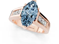 Fancy Blue Marquise Cut Diamond Solitaire Ring Set in Rose gold with Channel-Set Accent Stones and Prong Setting