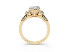 Heart Cut Diamond Three-Stone Ring Set in Yellow gold with Pavé Band and Smaller Side Stones