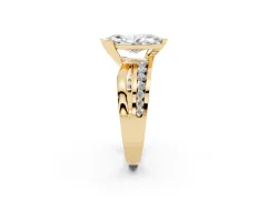 Marquise Cut Diamond Solitaire Ring Set in Yellow gold with Channel Set Split Shank and Tension Prongs