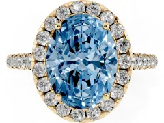 Fancy Blue Oval Cut Diamond Halo Pavé Engagement Ring Set in Yellow gold with Prong Setting