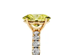 Fancy Yellow Oval Cut Diamond Pavé Solitaire Engagement Ring Set in Yellow gold with Prong Setting