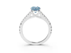 Fancy Blue Oval Cut Diamond Split Shank Pavé Engagement Ring Set in White gold with Prong-Held Center Stone