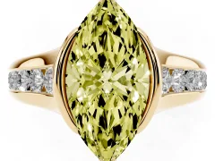 Fancy Yellow Marquise Cut Diamond Bezel-Set Solitaire Ring Set in Yellow gold with Channel-Set Band