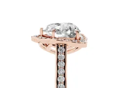 Heart Cut Diamond Halo Ring Set in Rose gold with Pavé-Lined Shoulders and Prong Setting
