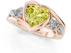 Fancy Yellow Heart Cut Diamond Bezel Bypass Ring Set in Rose gold with Round Accents